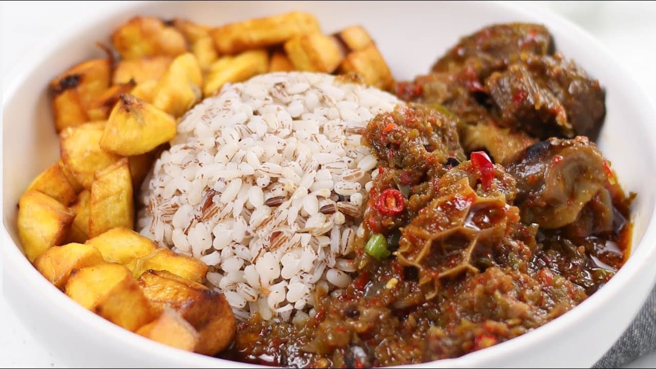 Ofada Rice & Ofada Sauce (Ayamase) served with rice and fried Plantain